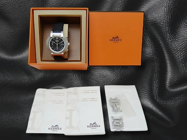 エルメス ノマード クロノグラフ Ref.NO1.910 SS グレーダイヤル オートクォーツ ベルト仕様 BOX・ギャラ付属 HERMES PARIS Nomade Chronograph [代行おまかせコース]