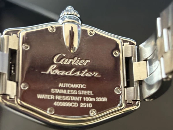 カルティエ ロードスター S/S ブラックダイヤル アラビック カルティエ修理請求書/説明書有り