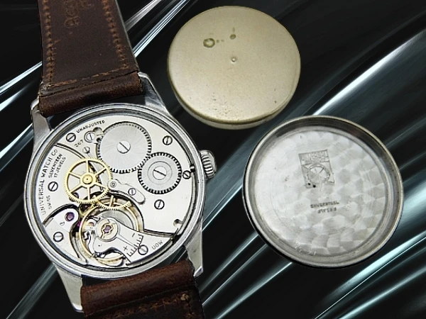 ユニバーサルジュネーブ 17石 Cal.267 SS シルバーダイヤル 社外製レザー装着 手巻き UNIVERSAL GENEVE [代行おまかせコース]