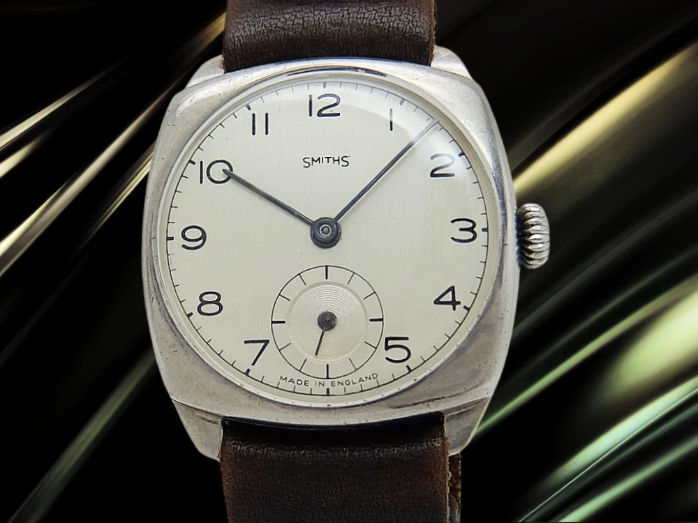 スミス 初期型 15石 Cal.1215 重量29g デニソン社銀無垢 クッション シルバーダイヤル 社外引き通しストラップ装着 手巻き 勤続記念 Smiths Sterling Silver 925 [代行おまかせコース]