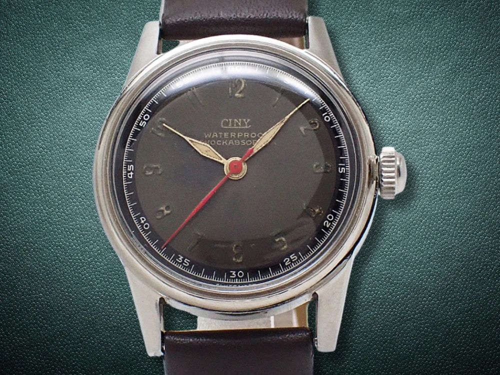 シニー ヴィンテージ 17石 SS ミリタリースタイル ブラック系文字盤 赤秒針 31mm 社外レザー装着 手巻き CINY [代行おまかせコース]