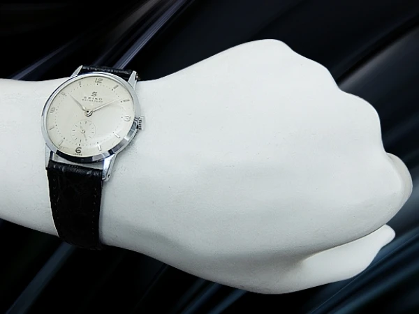 セイコー エキストラ フラット J14025 メッキ/SS 蛇Sマーク スモールセコンド 焼けたアイボリーダイヤル 社外レザー装着 アンティーク 手巻き SEIKO EXTRA FLAT [代行おまかせコース]