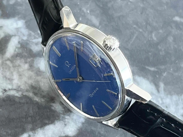 オメガ OMEGA ジュネーブ ブルー文字盤 136.011SP Cal.613 日産建設 勤続25年表彰 透かしΩマーク風防