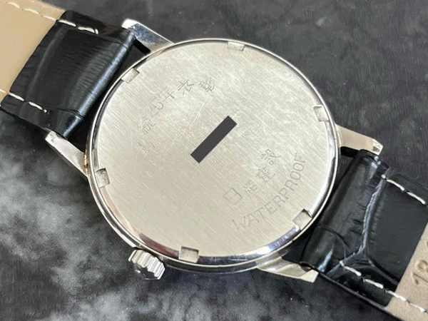 オメガ OMEGA ジュネーブ ブルー文字盤 136.011SP Cal.613 日産建設 勤続25年表彰 透かしΩマーク風防