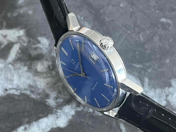 オメガ OMEGA ジュネーブ ブルー文字盤 136.011SP Cal.613 日産建設 勤続25年表彰刻印