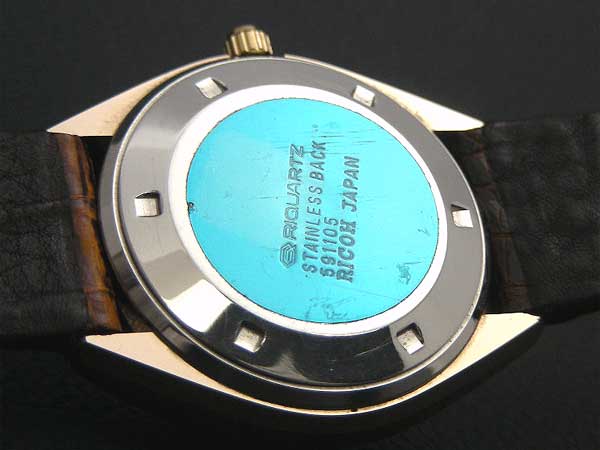 リコー リクオーツ RIQUARTZ デイト 超硬ケース 虎目石文字盤 |  アンティーウオッチマンはROLEX（ロレックス）・OMEGA（オメガ）・TUDOR（チュードル）などアンティーク腕時計の委託通販専門店—時計の委託・アンティーウオッチマン