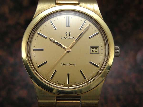 オメガ ジュネーブ デイト ゴールドダイヤルu0026ケース 手巻き | アンティーウオッチマンはROLEX（ロレックス）・OMEGA（オメガ ）・TUDOR（チュードル）などアンティーク腕時計の委託通販専門店—時計の委託・アンティーウオッチマン